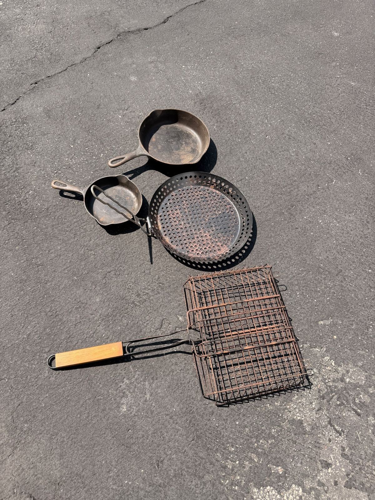 Cast Iron Skillets, Grill Basket and Perforated Grill Pan - 4 Piece Lot
